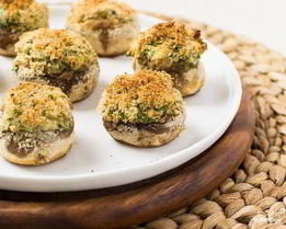 Грибы, фаршированные сыром, в духовке