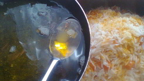 плов с тыквой , капченой рыбой и гранатом