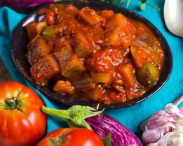 Капоната с помидорами в собственном соку