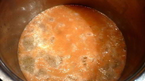 филе сома под овощным гратеном на ризотто с песто