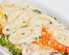 Кальмары в сметанном соусе