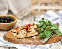 Масляная рыба, запеченная с овощами