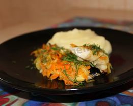 Минтай в духовке с луком и морковью