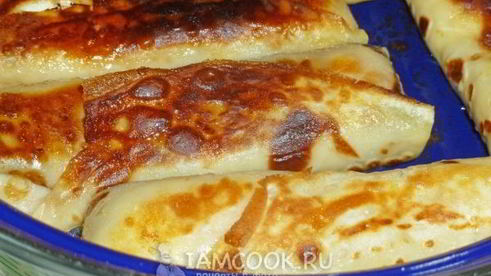 блины с творогом, обжаренные на сливочном масле