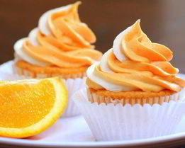 Апельсиновые капкейки с творожным кремом