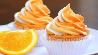 Апельсиновые капкейки с творожным кремом
