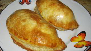 Пирожки с тушеной капустой